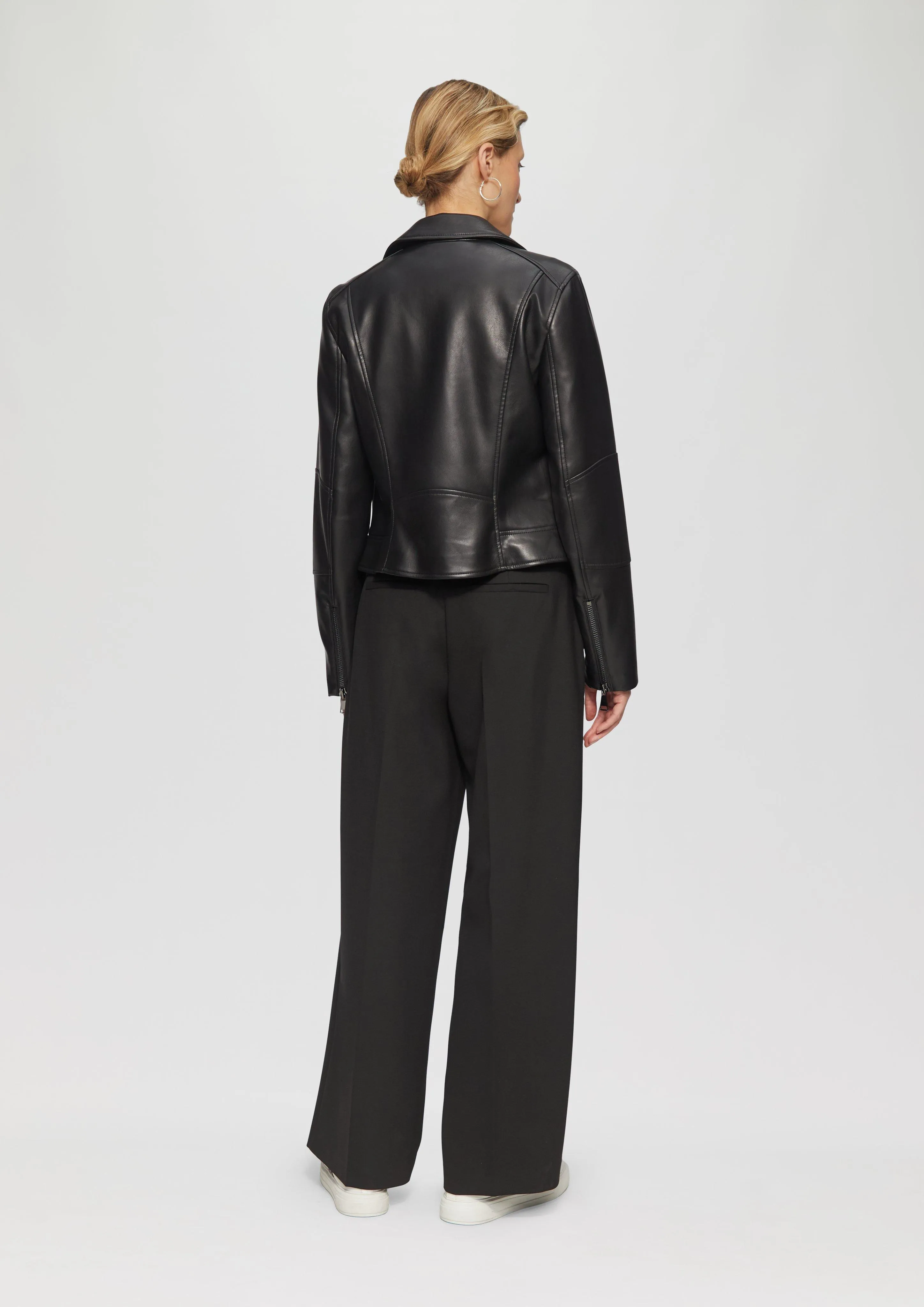 Slim-fitting faux leather jacket with a lapel collar